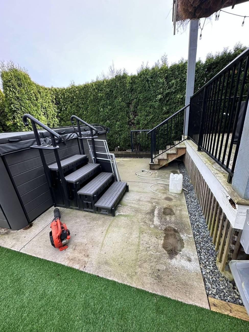 Backyard patio before pressure washing