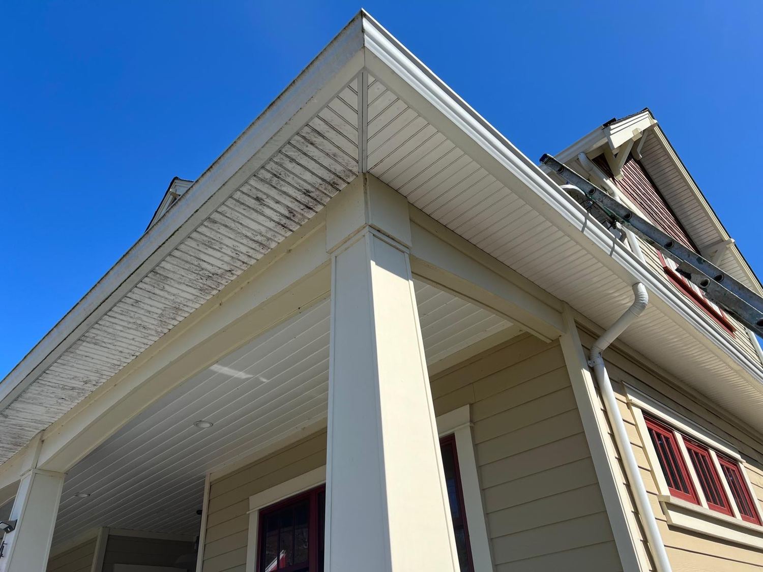 Soffit and fascia before and after cleaning